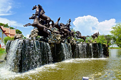Water feature surrounded by trees in Muang Boran (Ancient Siam) in Samut Prakan, Thailand